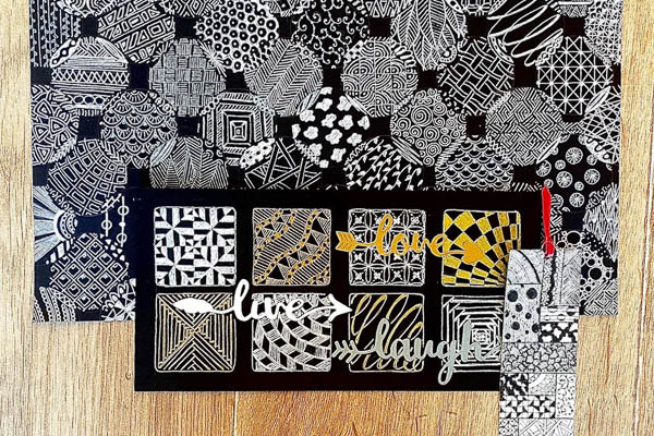 Zentangle dessins blancs sur papier noir